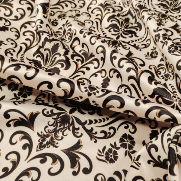 Tessuto Duchesse a fantasia motivo floreale panna - nero - bronzo
