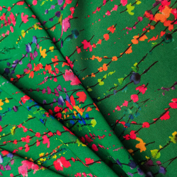 Tessuto Georgette a fantasia motivo astratto verde - fucsia - blu elettrico