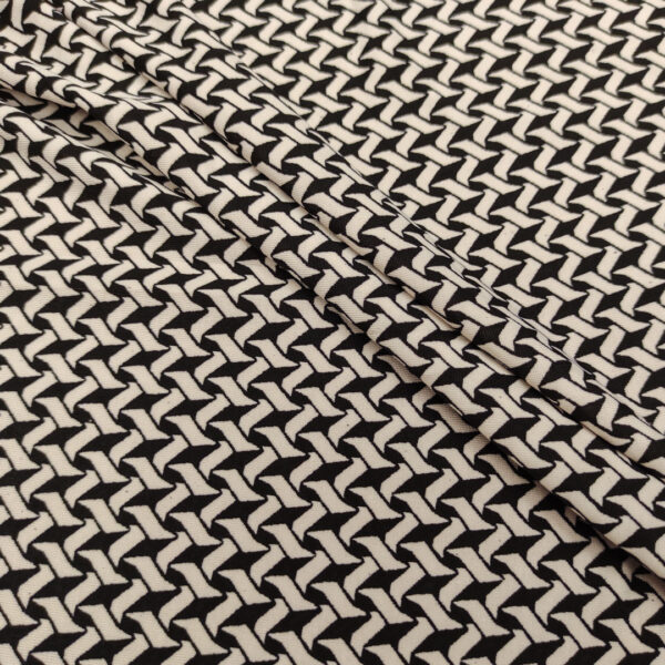 Tessuto Jersey a fantasia motivo geometrico bianco - nero