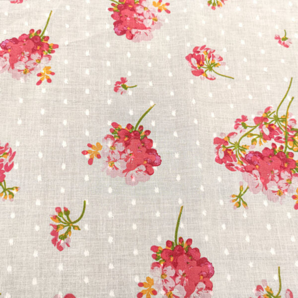 Tessuto Plumetis puro cotone a fantasia motivo floreale bianco - rosa - corallo