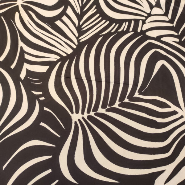 Tessuto Satin a fantasia motivo astratto beige - nero