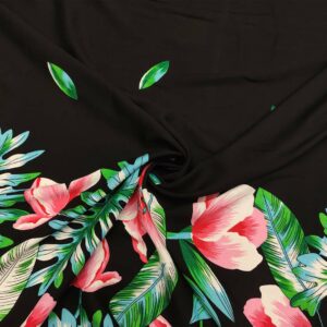 Tessuto Viscosa a fantasia motivo floreale ai bordi nero - turchese - verde - rosa