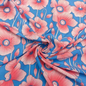 Tessuto Viscosa a fantasia motivo floreale turchese - rosa - bianco