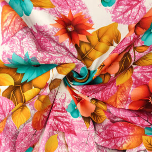 Tessuto Gabardine di Cotone a fantasia motivo floreale fucsia - turchese - corallo