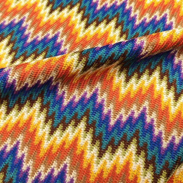Tessuto Maglia a rete a fantasia motivo geometrico arancione - viola - blu elettrico - rosso