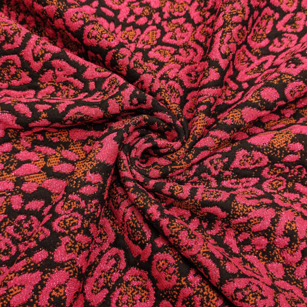 Tessuto Maglia Mano Lana lurex a fantasia motivo animalier fucsia - nero