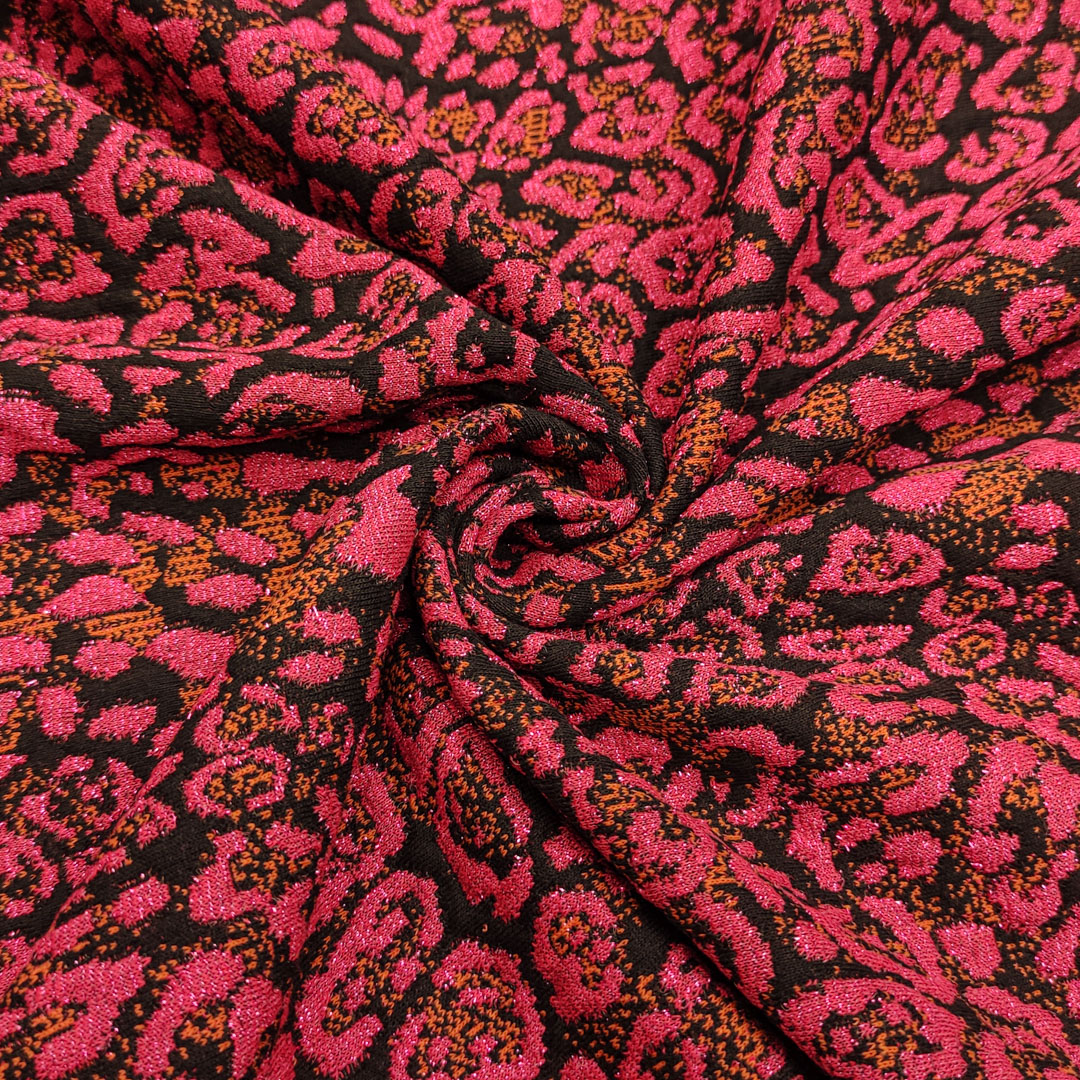 Tessuto Maglia Mano Lana lurex a fantasia motivo animalier fucsia - nero