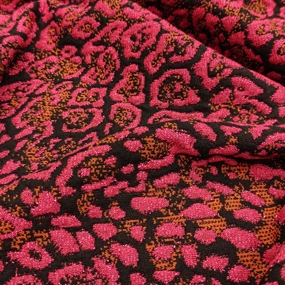Tessuto Maglia Mano Lana lurex a fantasia motivo animalier fucsia - nero