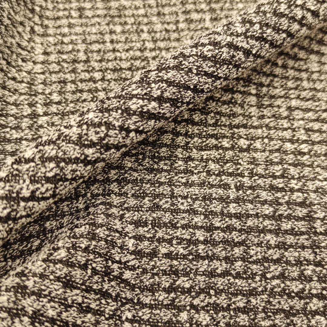 Tessuto Maglia Mano Lana motivo tweed grigio