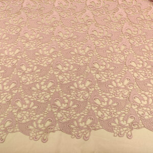 Tessuto Pizzo macramè motivo astratto rosa