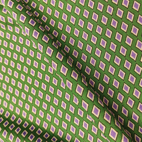 Tessuto Punto Milano a fantasia motivo geometrico verde - viola