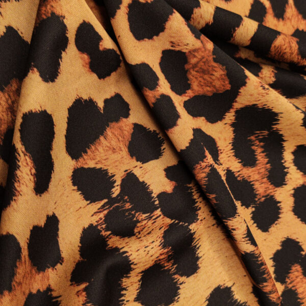 Tessuto Scuba Crepe a fantasia motivo animalier cuoio - ruggine - marrone