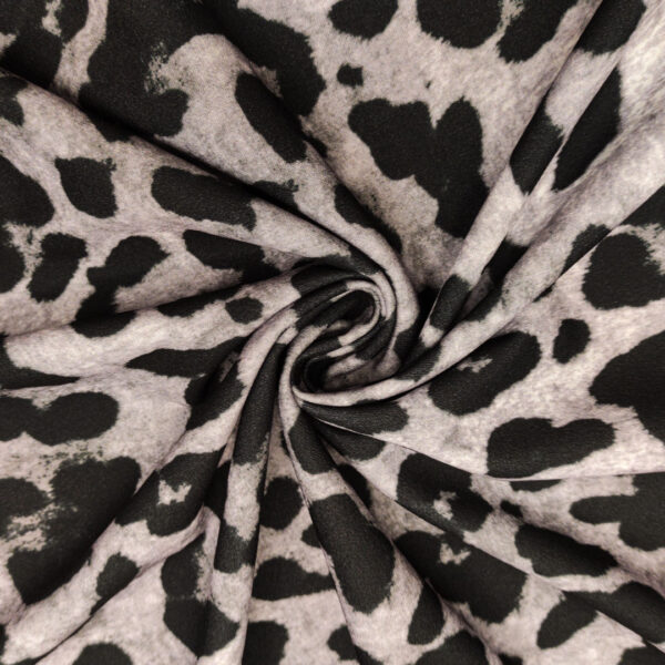 Tessuto Scuba Crepe a fantasia motivo animalier grigio - nero