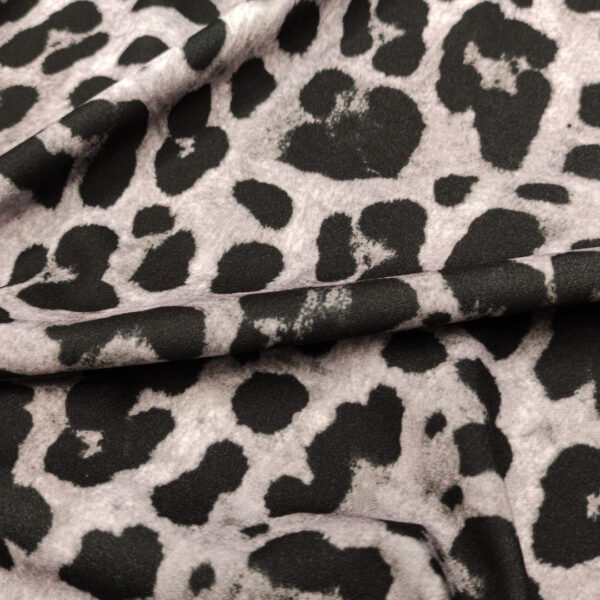 Tessuto Scuba Crepe a fantasia motivo animalier grigio - nero