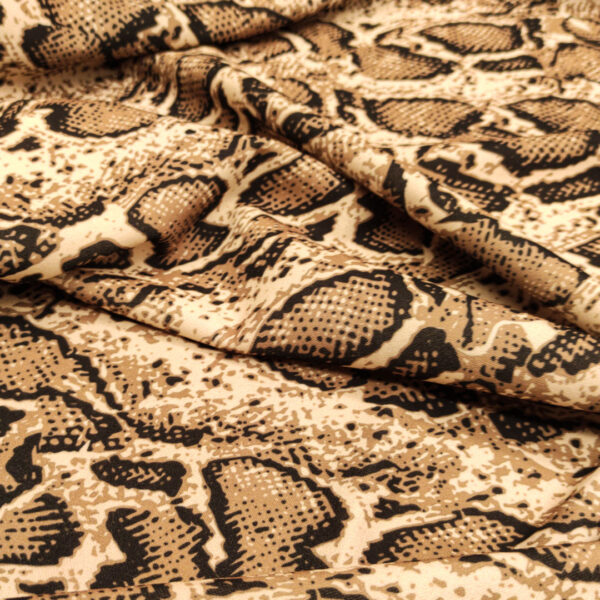 Tessuto Scuba Crepe a fantasia motivo animalier tabacco - beige chiaro - nero