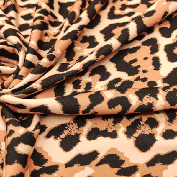 Tessuto Scuba Crepe a fantasia motivo animalier tabacco - beige - nero