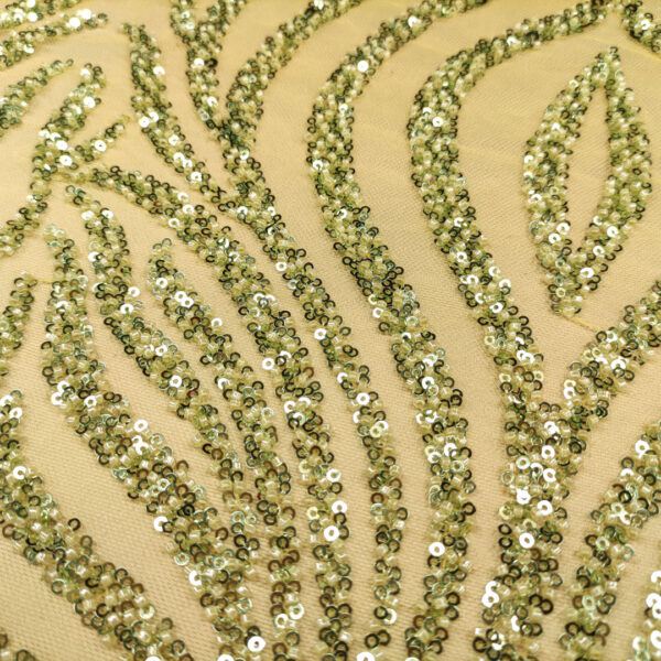 Tessuto Tulle mano seta ricamato con perline e paillettes motivo astratto verde acido
