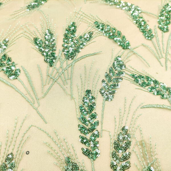 Tessuto Tulle mano seta ricamato con micro paillettes motivo floreale verde