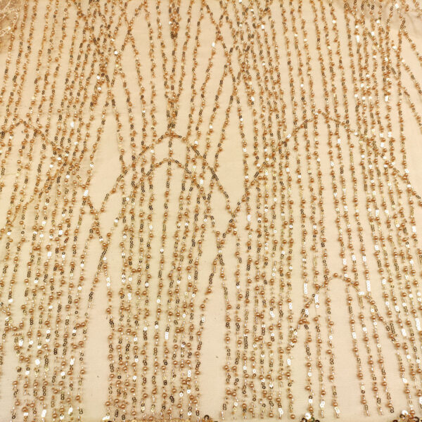 Tessuto Tulle mano seta ricamato con perle e pietre motivo astratto oro