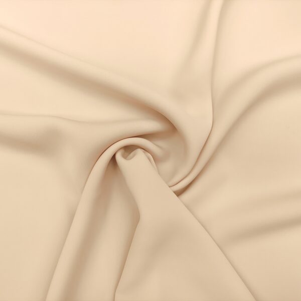 Tessuto Crepe morbido in tinta unita champagne