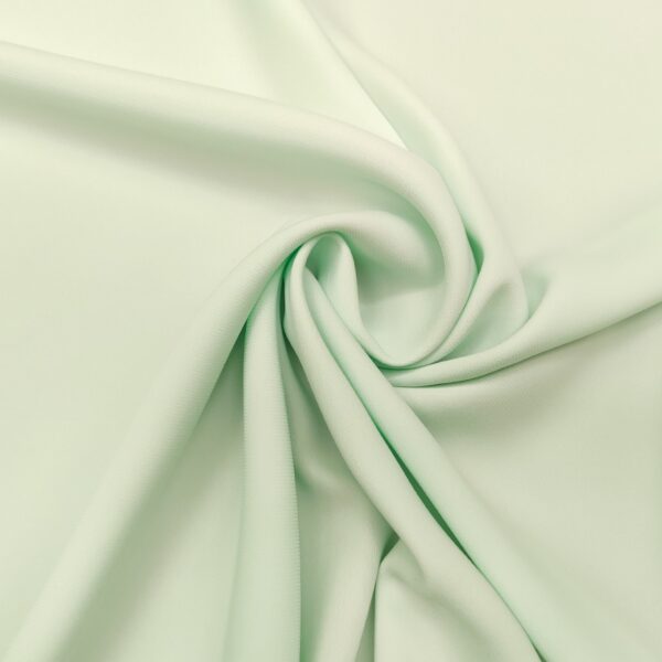 Tessuto Crepe morbido in tinta unita verdino