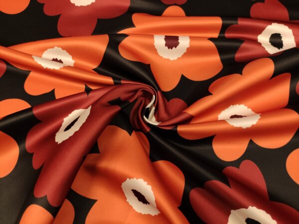 Tessuto Duchesse a fantasia motivo floreale nero - arancione