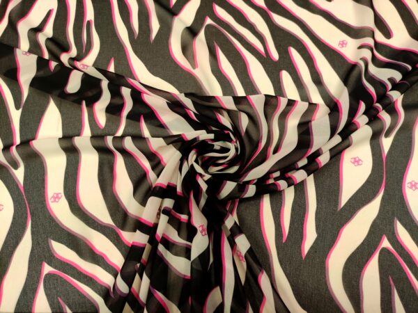 Tessuto Georgette a fantasia motivo animalier nero - fucsia