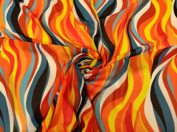 Tessuto Georgette a fantasia motivo astratto arancione - giallo - carta da zucchero