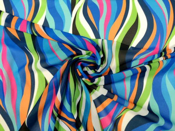 Tessuto Georgette a fantasia motivo astratto blu elettrico - arancione