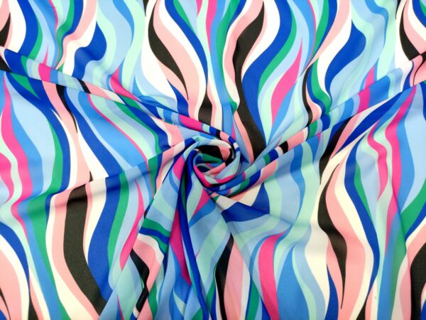 Tessuto Georgette a fantasia motivo astratto blu elettrico - rosa