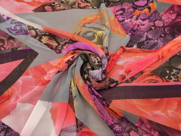 Tessuto Georgette a fantasia motivo astratto fucsia - arancione