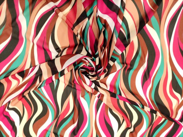 Tessuto Georgette a fantasia motivo astratto fucsia - nero