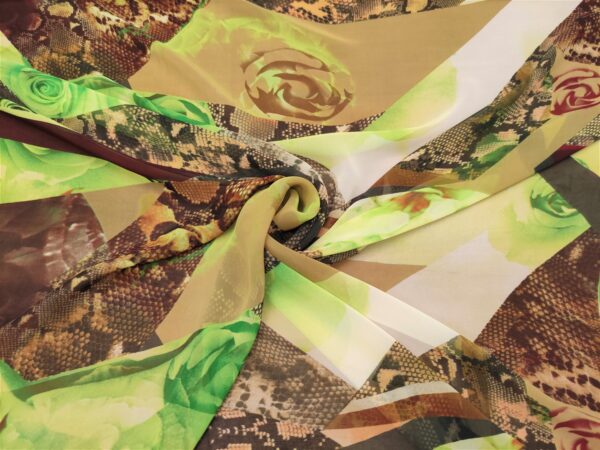 Tessuto Georgette a fantasia motivo astratto verde marrone