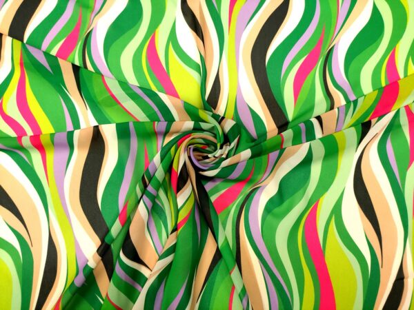 Tessuto Georgette a fantasia motivo astratto verde prato