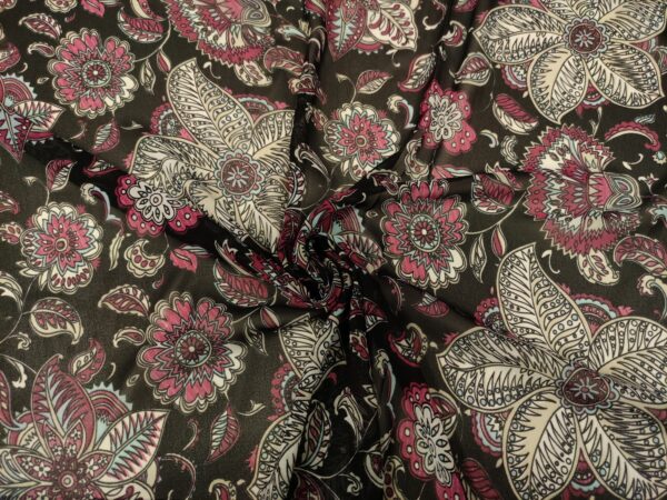 Tessuto Georgette a fantasia motivo etnico nero - fucsia