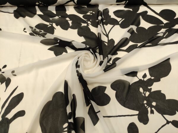 Tessuto Georgette a fantasia motivo floreale nero - bianco