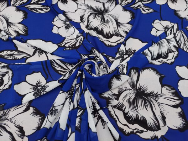 Tessuto Georgette a fantasia motivo floreale blu elettrico - bianco