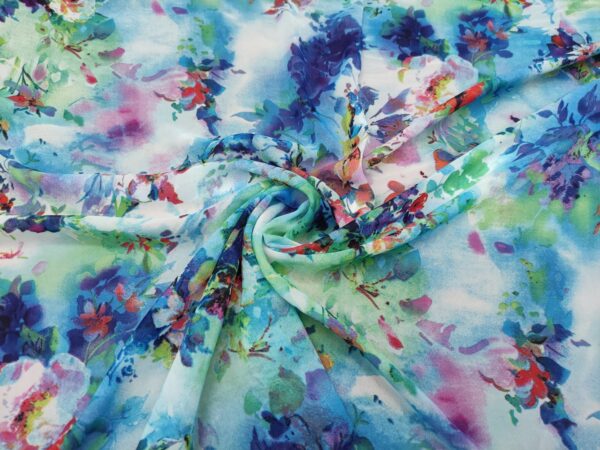 Tessuto Georgette a fantasia motivo floreale verde tiffany - celeste