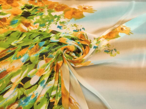 Tessuto Georgette a fantasia motivo floreale giallo - celeste