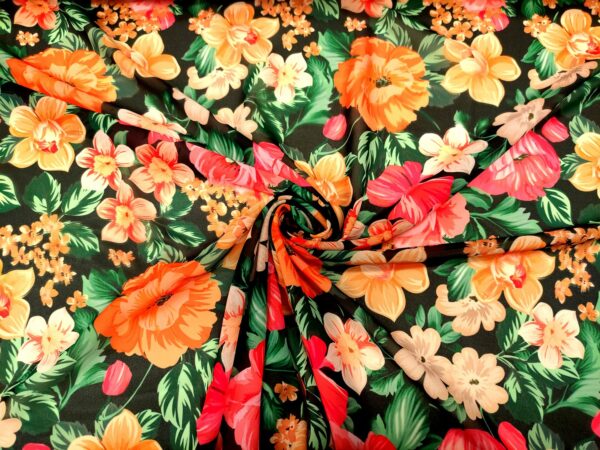 Tessuto Georgette a fantasia motivo floreale nero - arancione