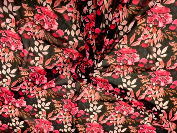 Tessuto Georgette a fantasia motivo floreale nero - fucsia