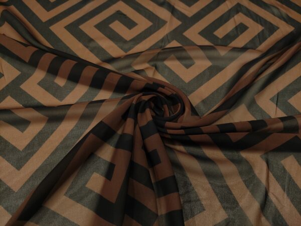 Tessuto Georgette a fantasia motivo geometrico marrone - nero