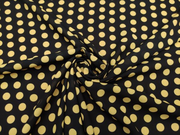 Tessuto Georgette a fantasia motivo pois giallo - nero