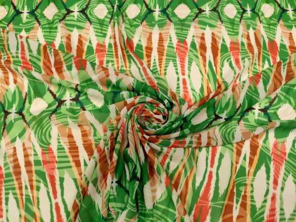 Tessuto Georgette a fantasia motivo astratto  verde - arancione