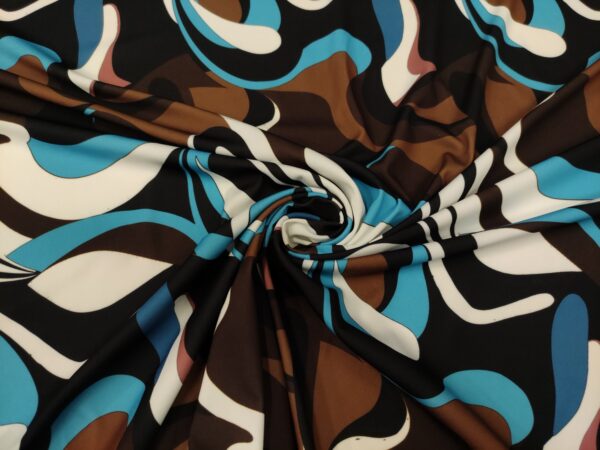 Tessuto jersey a fantasia motivo astratto turchese - marrone - nero