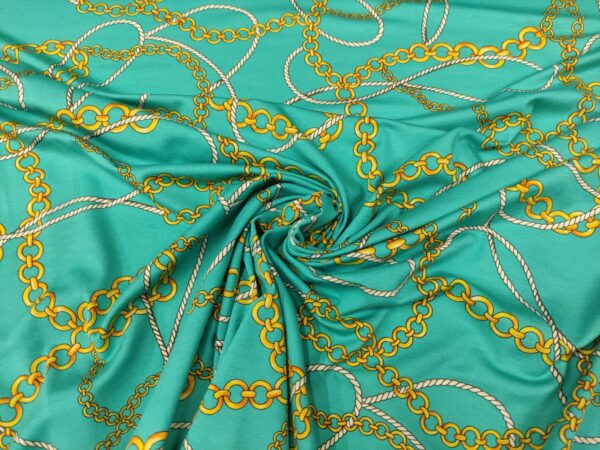 Tessuto jersey di viscosa a fantasia motivo astratto verde tiffany - giallo