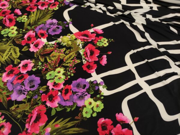 Tessuto jersey a fantasia motivo floreale fucsia - nero - bianco