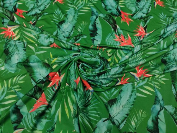 Tessuto jersey a fantasia motivo floreale verde prato - rosso