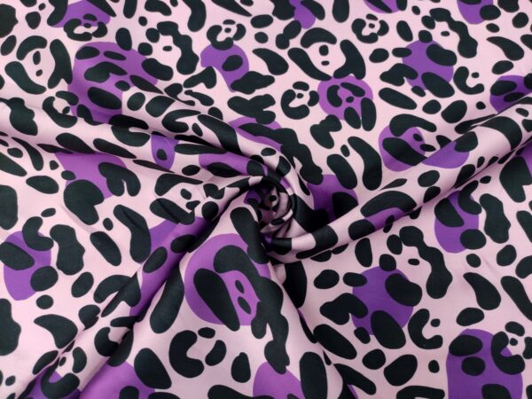 Tessuto Mikado a fantasia motivo animalier rosa - viola