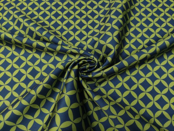 Tessuto Mikado a fantasia motivo geometrico blu - verde